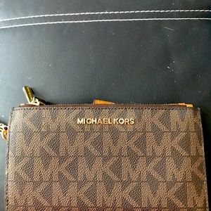 Michael Kors authentic brand wristlet/wallet!